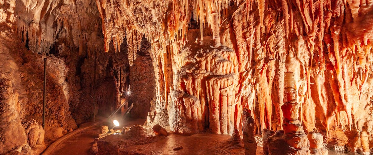 A cave with stalactites and stalagmites.