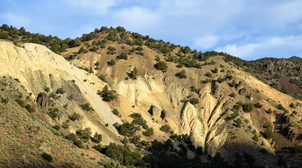 Early Morning Hills Light up near Marysvale, Utah while Darkening Skies Cast Shadows