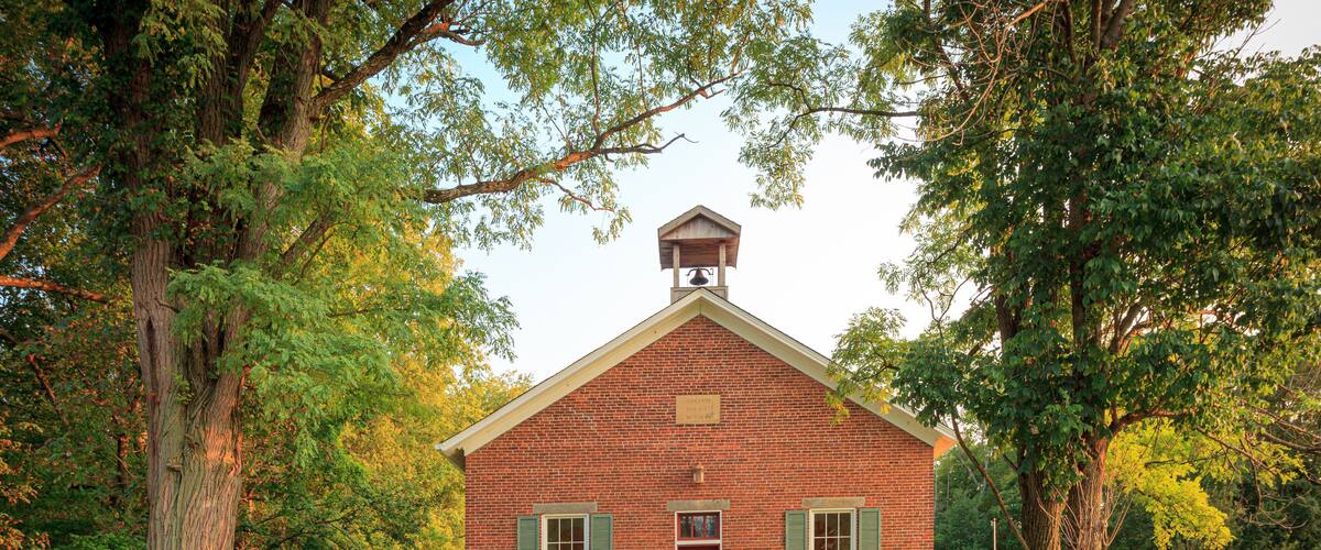 Exterior of old brick one room schoolhouse in Ohio horizontal