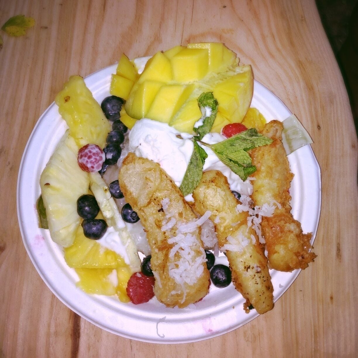 The sampler platter, featuring fried bananas, fresh fruit, sticky rice, and homemade coconut ice cream by Ring of Fire. YUM!

The Oregon Country Fair, an outgrowth of the counter-culture movement, has been going strong for over 40 years. This non-profit, 3 day, festival features hundreds of entertainers and performers, artisans and gourmet food vendors. 

There are magical surprises at every corner, a lively parade that roams around the grounds several times a day, and plenty of shade and secret coves to take a nice respite from the ongoing festivities. 

Event goers are encouraged to come in costume, but both costumes and face/body paint are available by vendors inside the Fair. Really you are encouraged to come as you are or whoever you wish to be. Toplessness is allowed and various forms of nudity are often witnessed. 

I've partook in some fantastic festivals all over the world, but it's true what they say, there's no place like home...The Oregon Country Fair, or simply "Fair," is truly world class. 

What a beautiful, wild, and fun weekend with the kindest, most loving weirdos you'll ever meet! 

"The Oregon Country Fair creates events and experiences that nourish the spirit, explore living artfully and authentically on Earth, and transform culture in magical, joyous and healthy ways." 

Held annually every 2nd weekend of July, Fri-Sun.