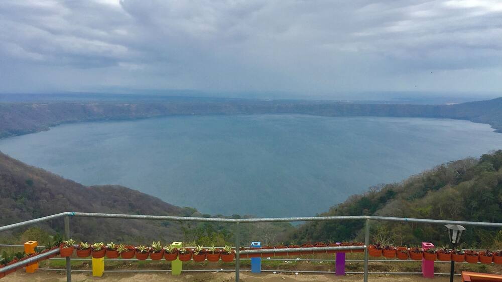 Apoyo Lagoon rests in the crater of an extinct volcano. At the lookout point there are many shops/vendors and places to eat and a restroom (for a price). It's very windy and much cooler up there so bring layers! This is a must see when in Nicaragua!