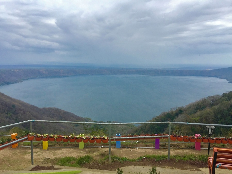 Apoyo Lagoon rests in the crater of an extinct volcano. At the lookout point there are many shops/vendors and places to eat and a restroom (for a price). It's very windy and much cooler up there so bring layers! This is a must see when in Nicaragua!