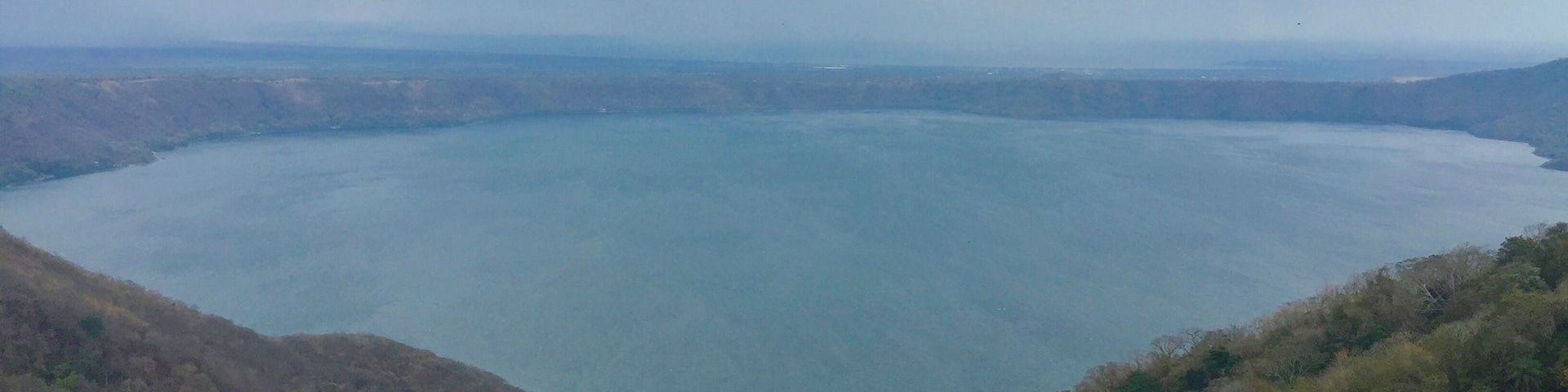 Apoyo Lagoon rests in the crater of an extinct volcano. At the lookout point there are many shops/vendors and places to eat and a restroom (for a price). It's very windy and much cooler up there so bring layers! This is a must see when in Nicaragua!