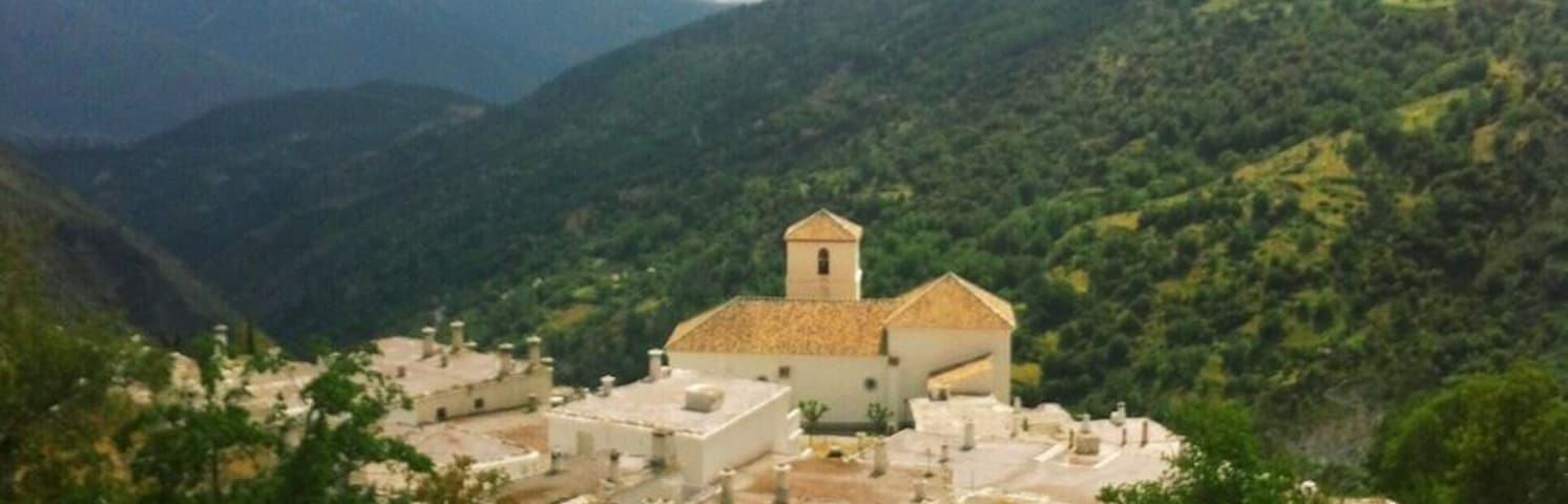 #TroveOn
Bubión is one of many of the small, white-washed villages in the Alpujarras, about an hour bus ride from Granada, Spain. This shot was taken from the trail that traverses the hillsides, connecting these tiny, serene little hamlets, surrounded by rolling hills and gorgeous greenery. Go during the afternoon, around siesta time, and you'll find the zigzagged cobblestone streets nearly deserted, leaving Bubión and its neighbors tranquil and, truly, breathtaking visions in white.
This image was taken in 2013 on an iPhone 4, and recently edited on an iPhone 5s with the VSCOcam app.