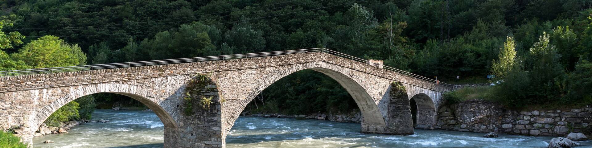 Stone bridge over the Dora Baltea River, Echallod, near Issogne, Aosta Valley (Italy)