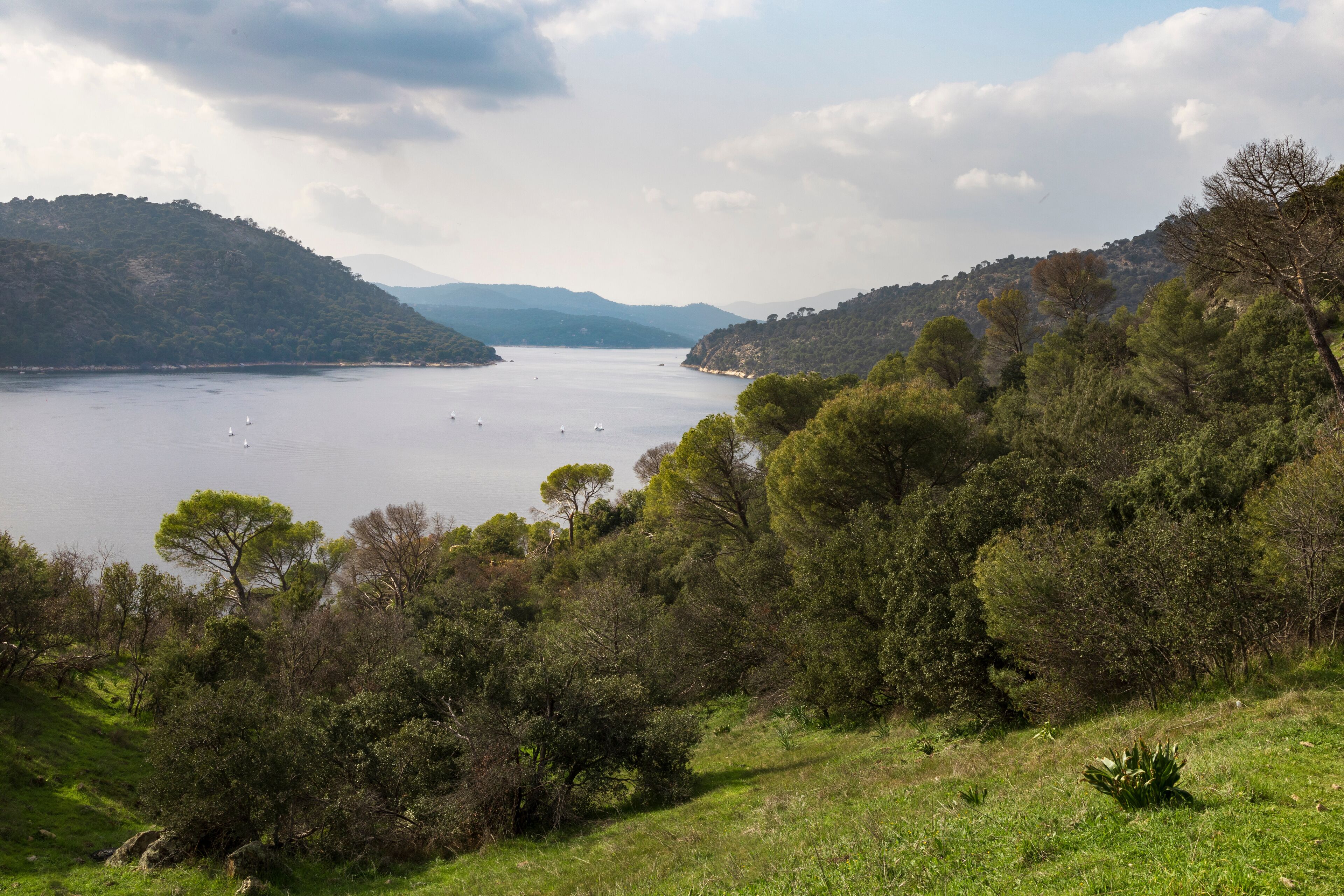 San Juan reservoir on a sunny day with nice clouds. San Juan reservoir near Pelayos de la presa in Madrid. Landscape photography