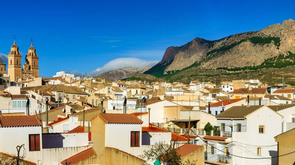 Panoramic view of an Andalusian village with its white houses and tall church towers, Velez Rubio, Andalusia.