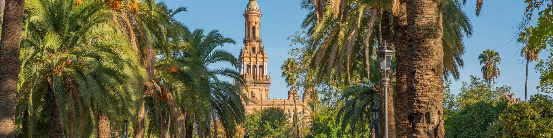Parque de Maria Luisa is a famous public park in Sevilla, along the Guadalquivir River, Andalusia. panorama