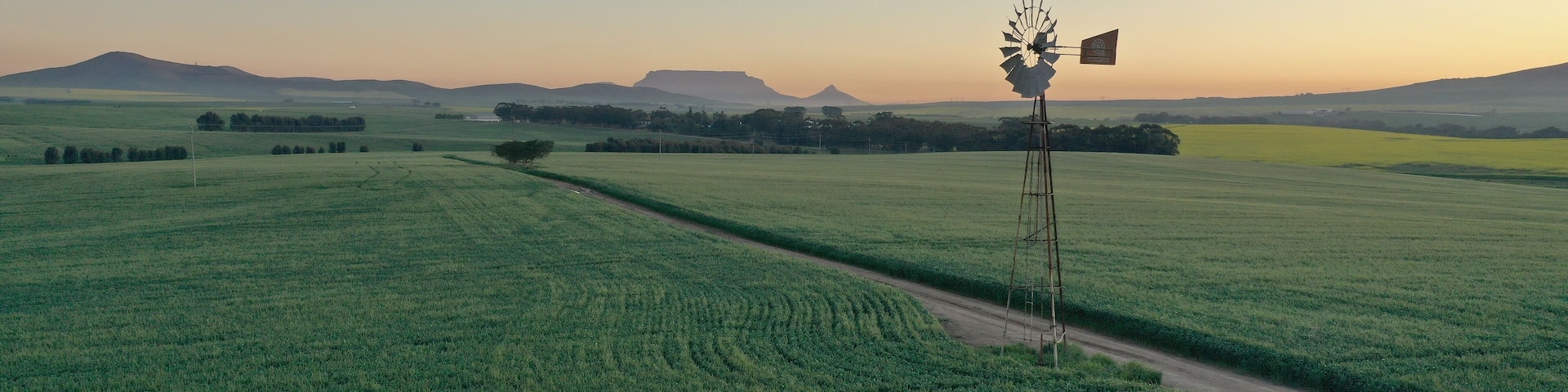 Beautiful sunset in Cape Town South Africa. Old windmill with Table Mountain in the background. Philadelphia, Western Cape South Africa.