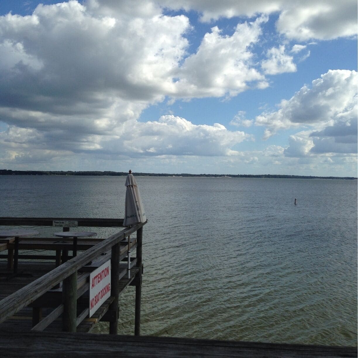 Gator Joes (a restaurant) sits on a lake, and has an extended porch out over the water where you can sit and eat. Not to mention a volley ball net on the sand, and swimming is permitted! 