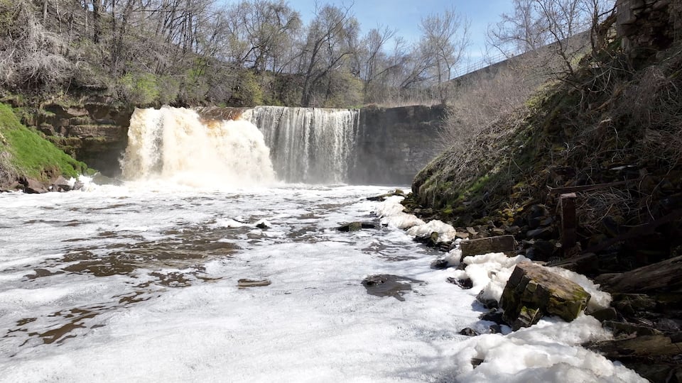 Beautiful waterfall Medina Falls, NY with 40 foot drop over limestone shelf destination for kayakers and tourist who visit this small town in up state New York