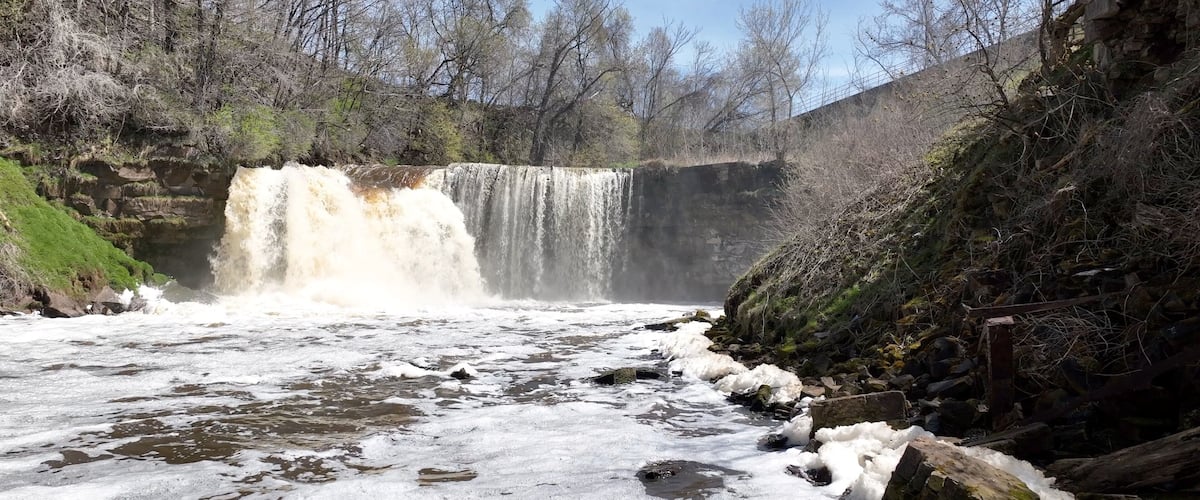 Beautiful waterfall Medina Falls, NY with 40 foot drop over limestone shelf destination for kayakers and tourist who visit this small town in up state New York