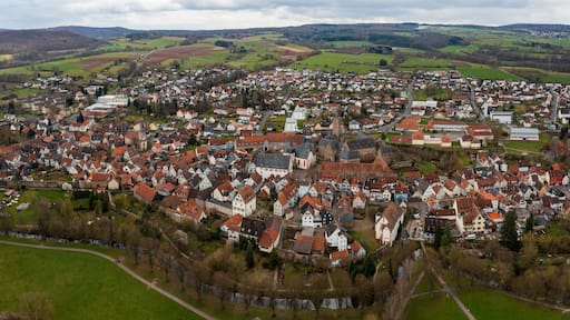 Aerial view around the old town of Steinau an der Straße in Germany on a cloudy autumn day