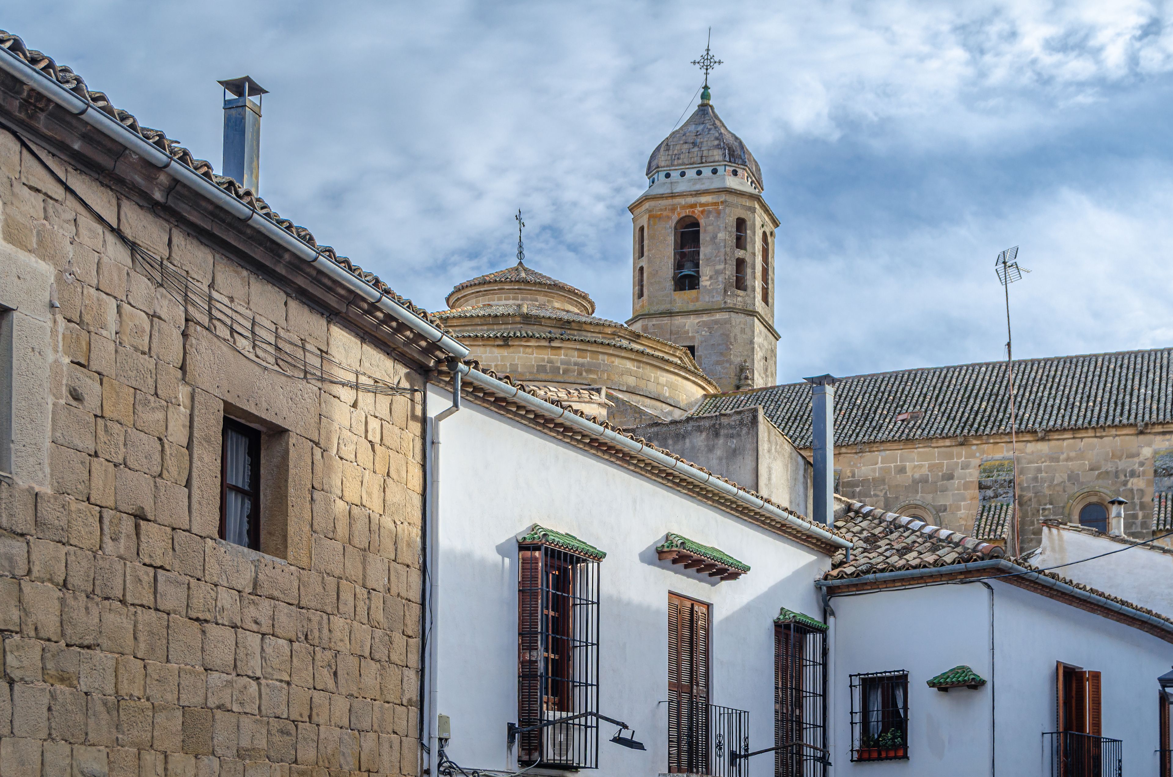 A historic building with a bell tower and domed roof.