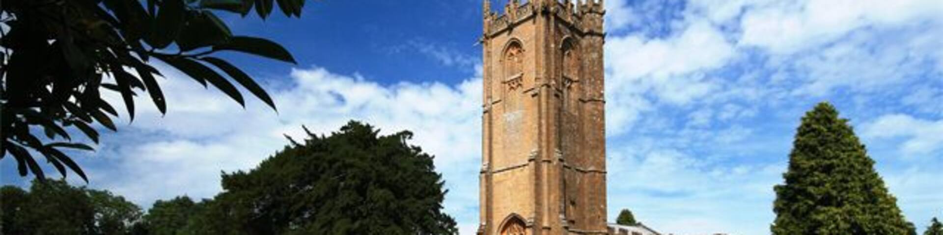 St George's parish church and churchyard, Hinton St George, Somerset, seen from the southwest