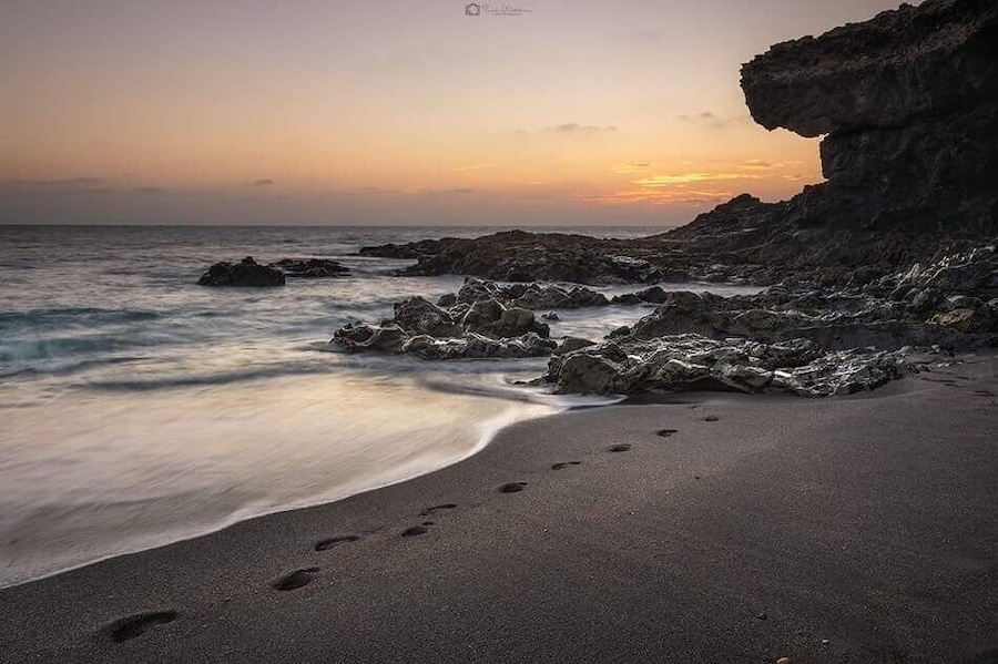 Foot prints on beach at Ajuy in fuerteventura