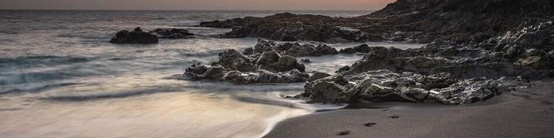 Foot prints on beach at Ajuy in fuerteventura