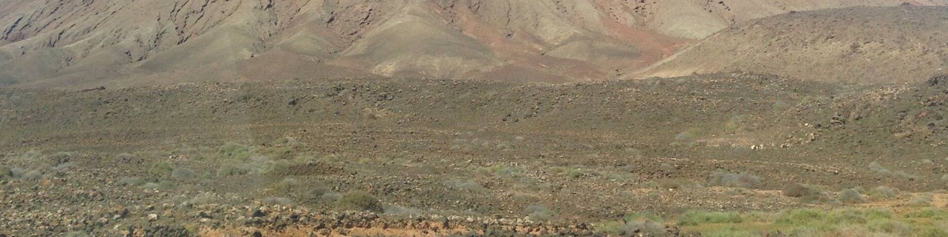 A view of the mountain from my car, on my way to corralejo seeing this inactive vulcano mountain was soothing to my soul