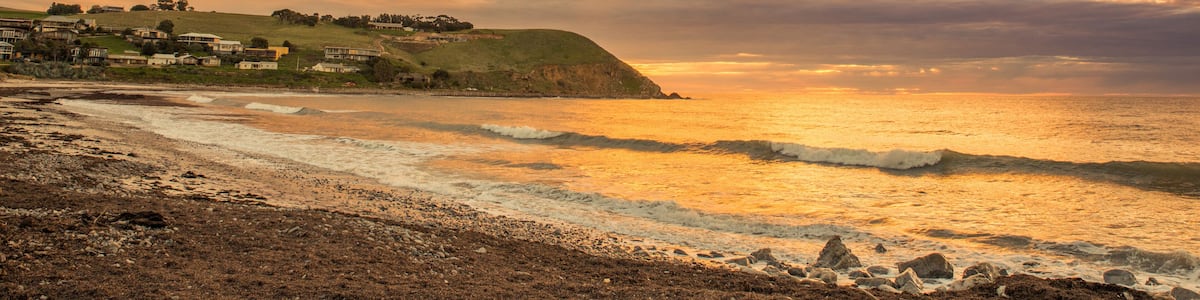 Colourful sunset at the beach with pebbles in Myponga Beach South Australia
