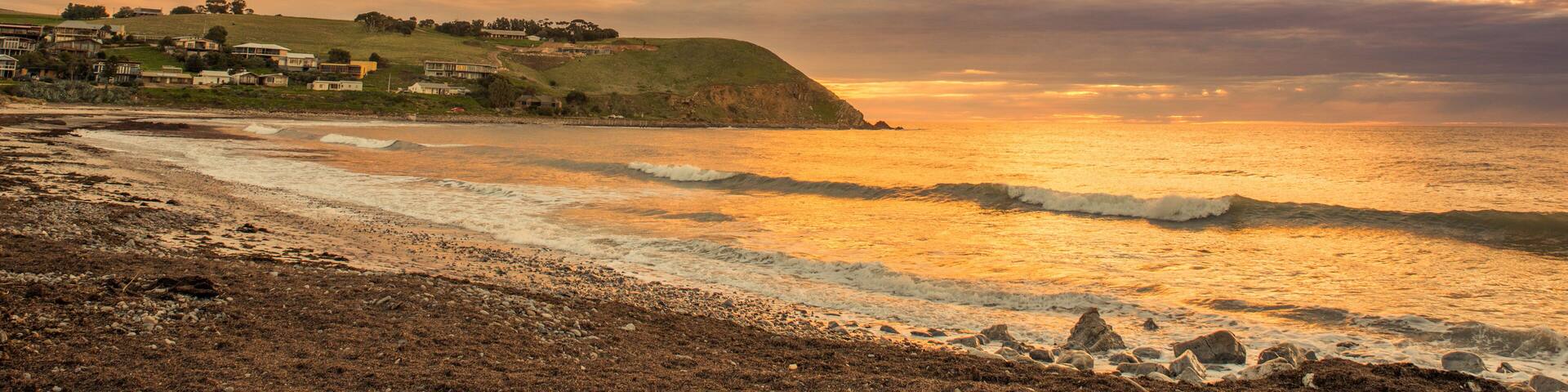 Colourful sunset at the beach with pebbles in Myponga Beach South Australia