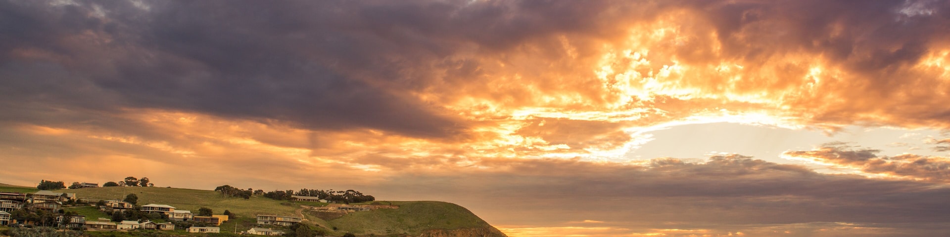 Colourful sunset at the beach with pebbles in Myponga Beach South Australia