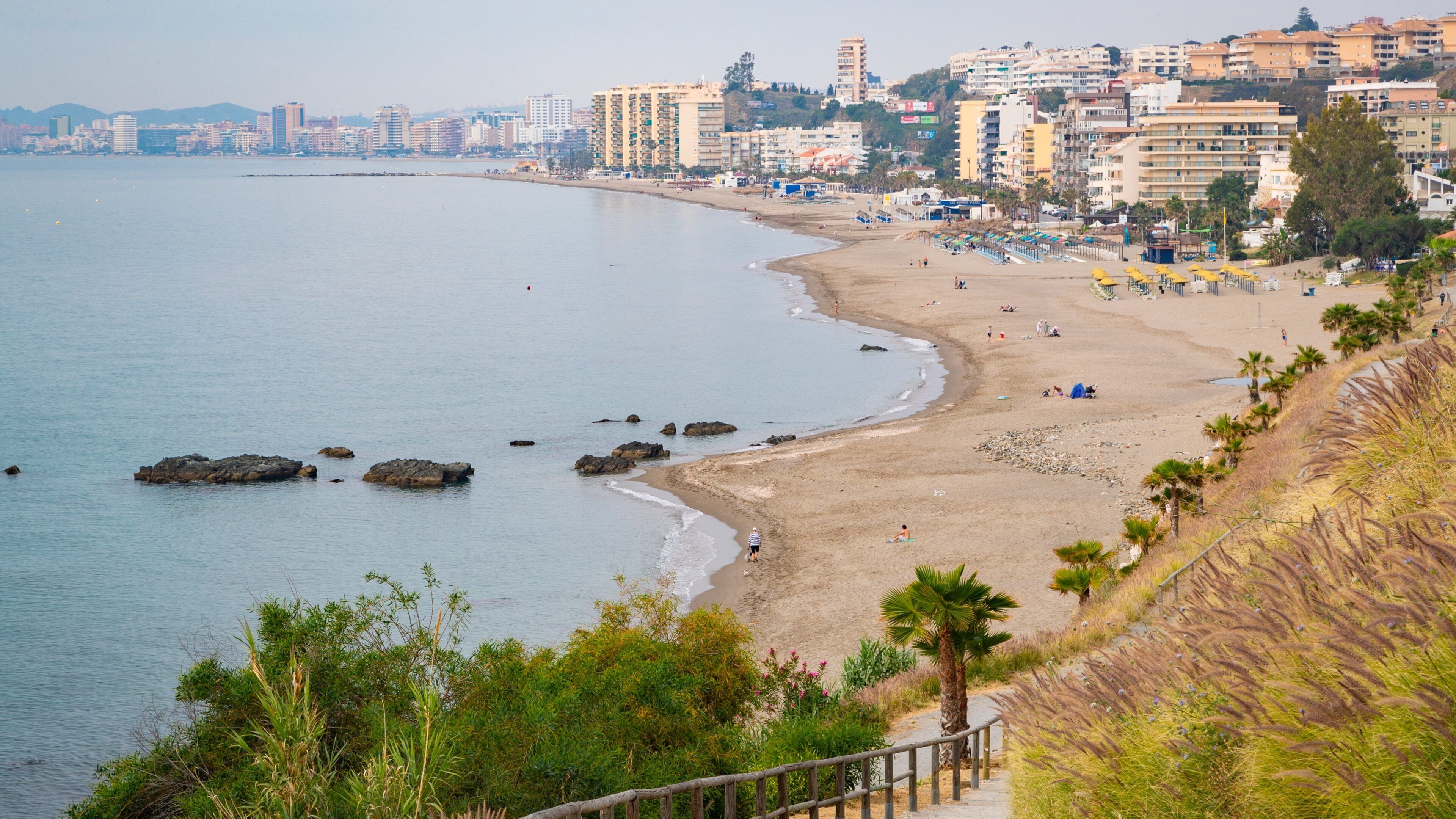 Carvajal Beach which includes general coastal views, a beach and a coastal town