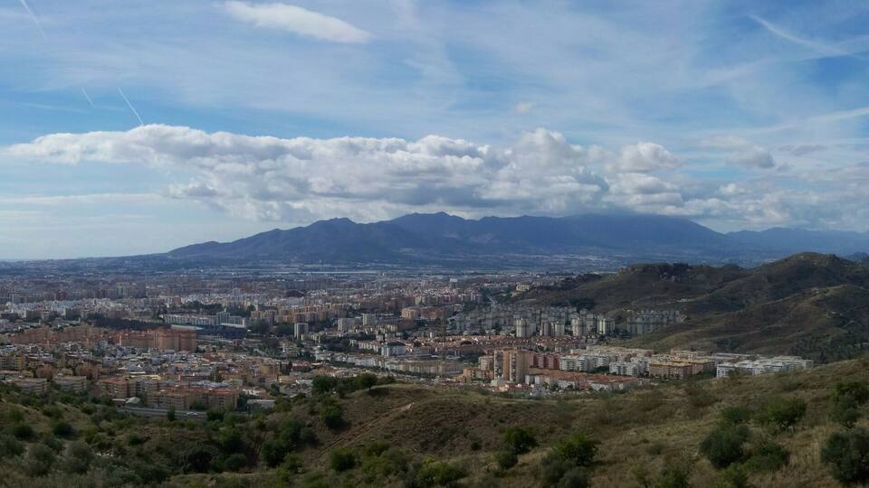 Málaga panoromic view from the highway A-7000, in Montes de Málaga, Andalusia, Spain.