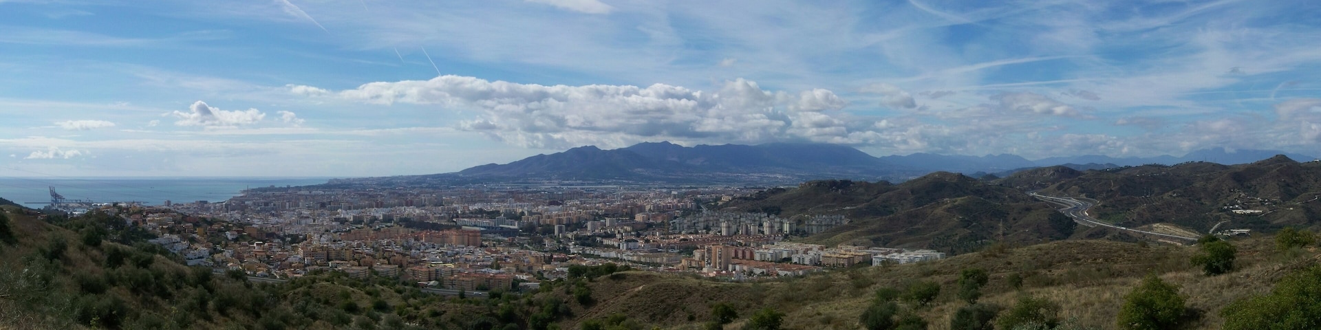 Málaga panoromic view from the highway A-7000, in Montes de Málaga, Andalusia, Spain.