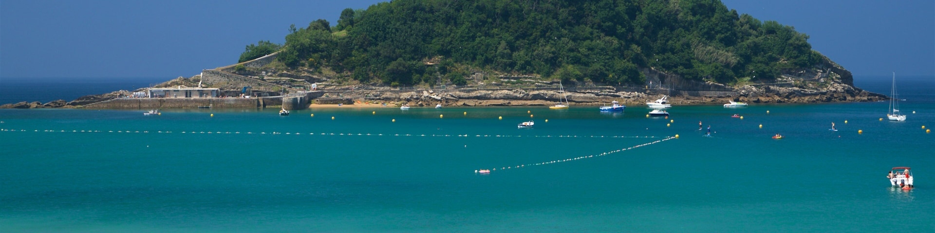 Santa Clara Island showing island images, a beach and general coastal views