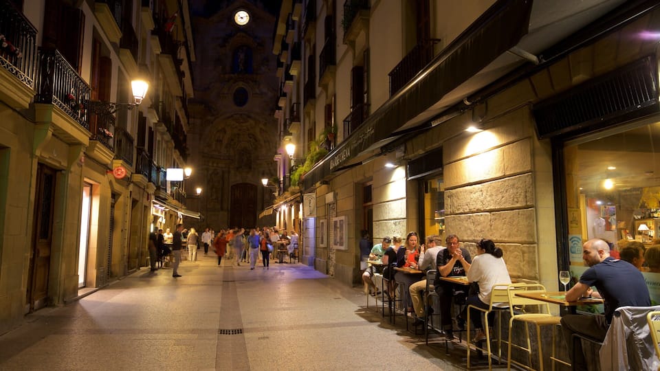 Old Town showing night scenes and street scenes as well as a small group of people