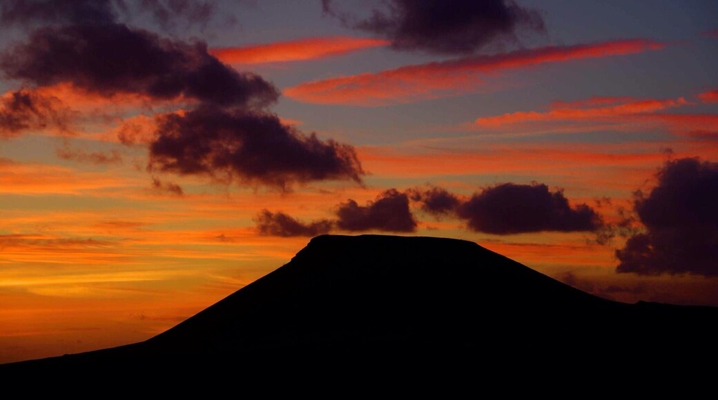 Beautiful sunset over the volcano, the clouds looking like smoke from the eruption. #sunset #sky #hiking #colorful