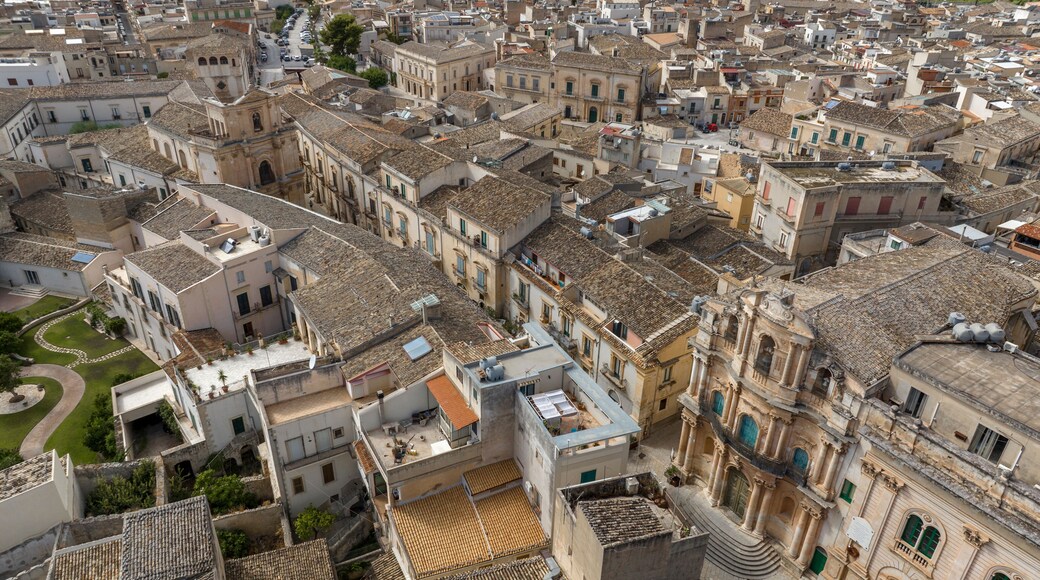 Aerial view of the historic center of Scicli, in the province of Ragusa, Sicily, Italy. The Church of San Michele Arcangelo and the Church of San Giovanni are also nearby.
