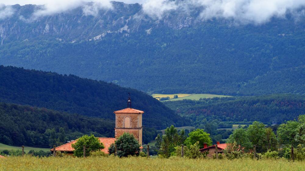 Foggy landscape of the town of Quintanilla in Valdegovia. Basque Country, Spain
