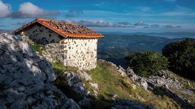 Santikurutz Chapel (Holy Cross) on the way up to the summit of Orisol. Álava, Basque Country, Spain