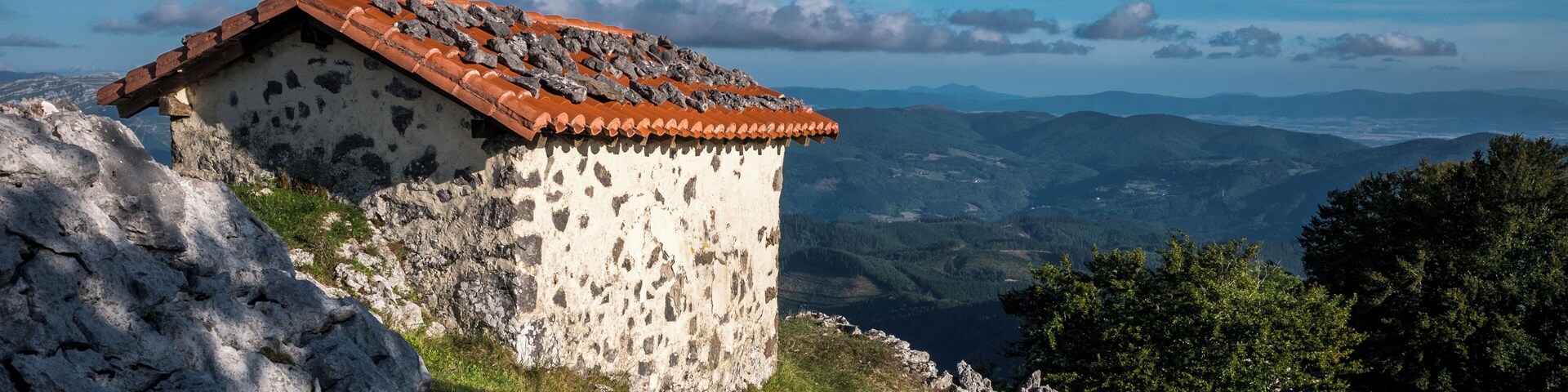 Santikurutz Chapel (Holy Cross) on the way up to the summit of Orisol. Álava, Basque Country, Spain