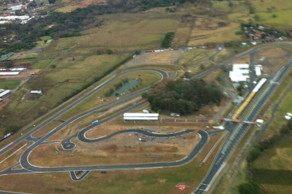 An aerial view of a complex highway interchange with multiple ramps and junctions.