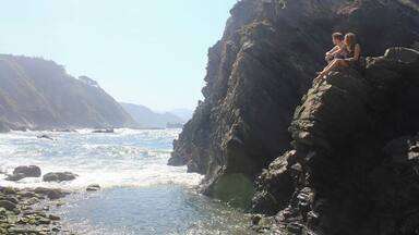 Walking over hard rocks, passing the tourists, you find this beautiful part of Asturias. It's hidden at the end of a rough path, but definitely worth it. Enjoy the view and sound of the waves crashing by climbing on a rock. It's very peaceful.