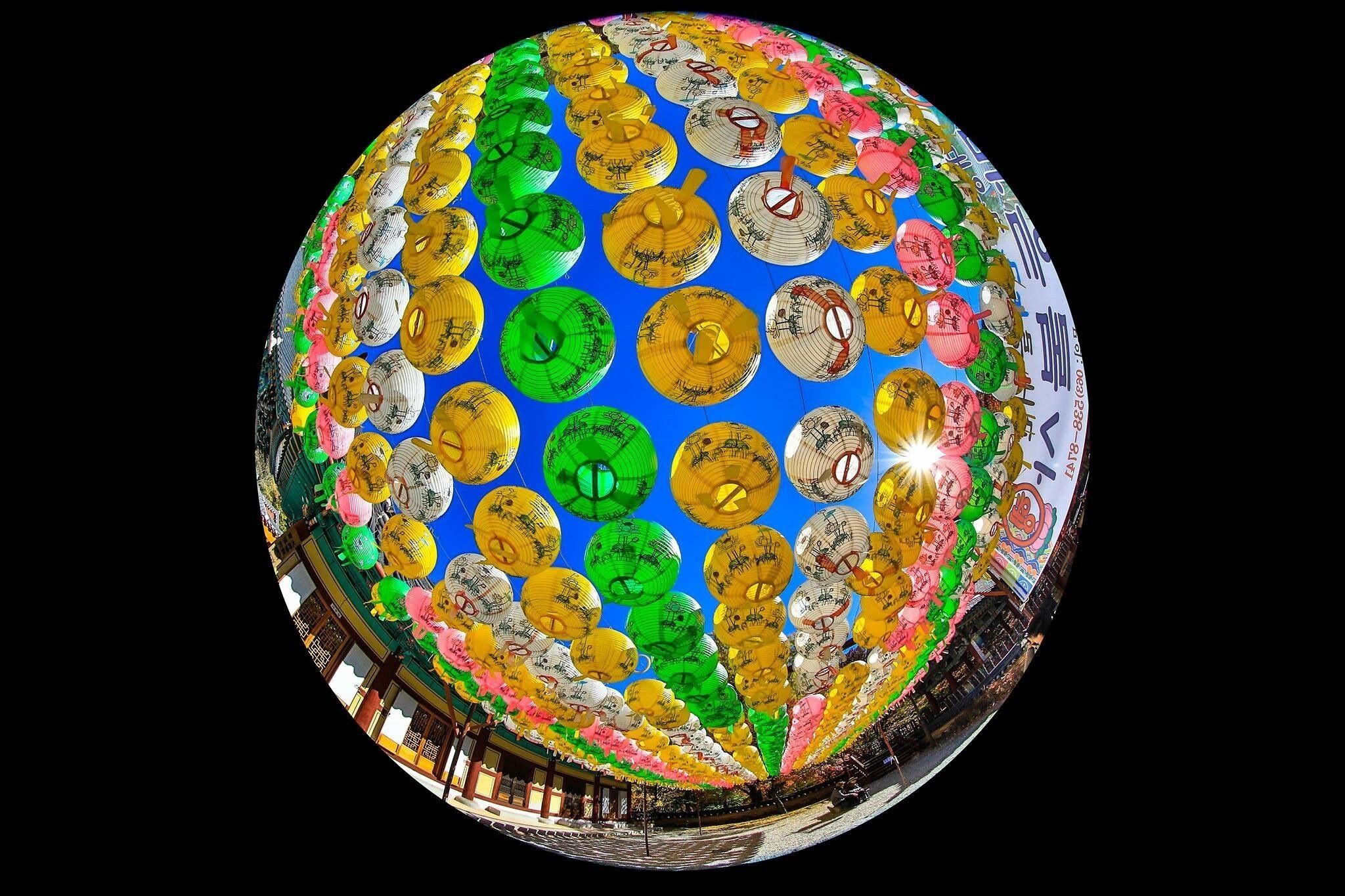 A series of colourful lanterns decorating the Temple within the Naejangshan. #colorful
#perspective