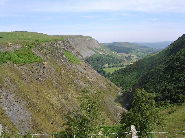 Afon Twymyn gorge. The head of the Twymyn valley with the escarpment of Craig y Maes on the left. Taken from the viewpoint on the minor road 1 mile East of Dylife.