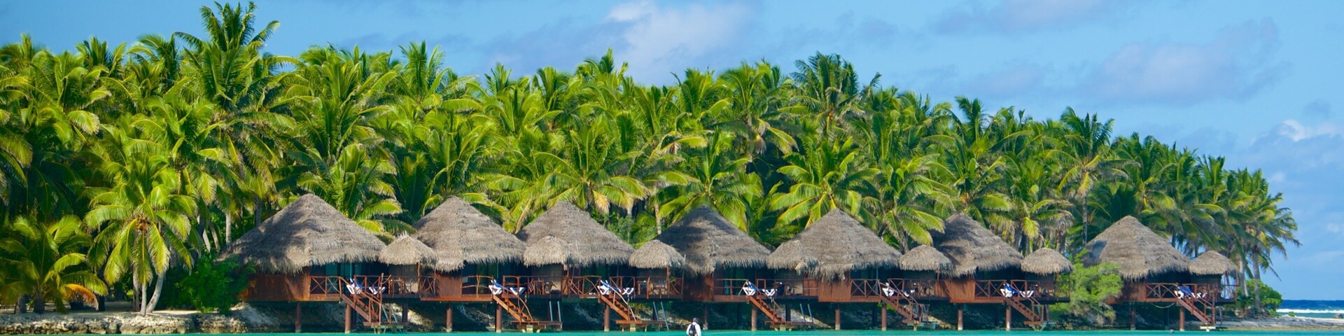 Akitua Island which includes general coastal views and tropical scenes