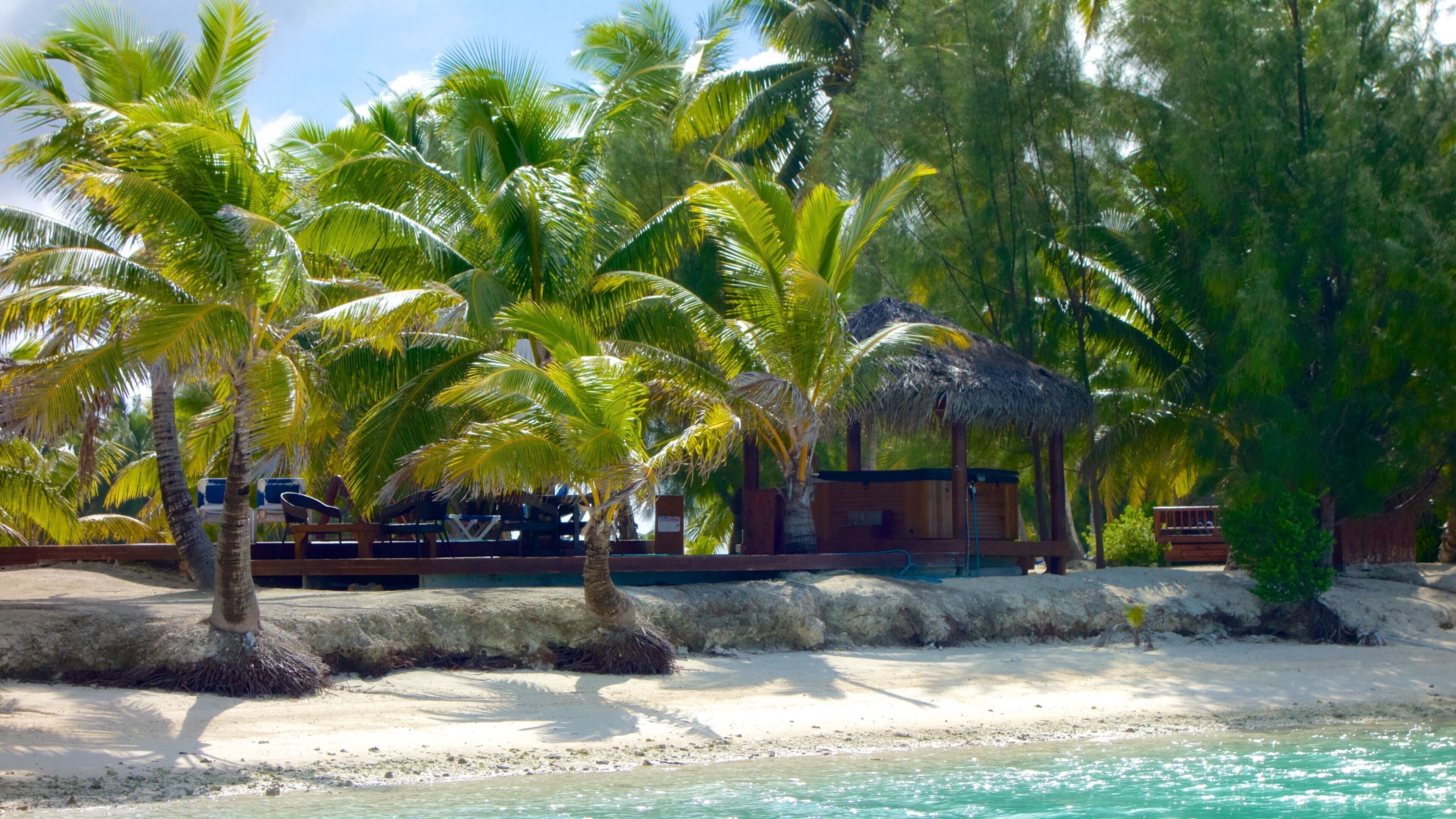 Akitua Island que inclui cenas tropicais e uma praia