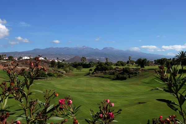 FWC8FF Golf del Sur, with the green golf course and Mount Teide in the background. Golf del Sur, Tenerife, Canary Islands.