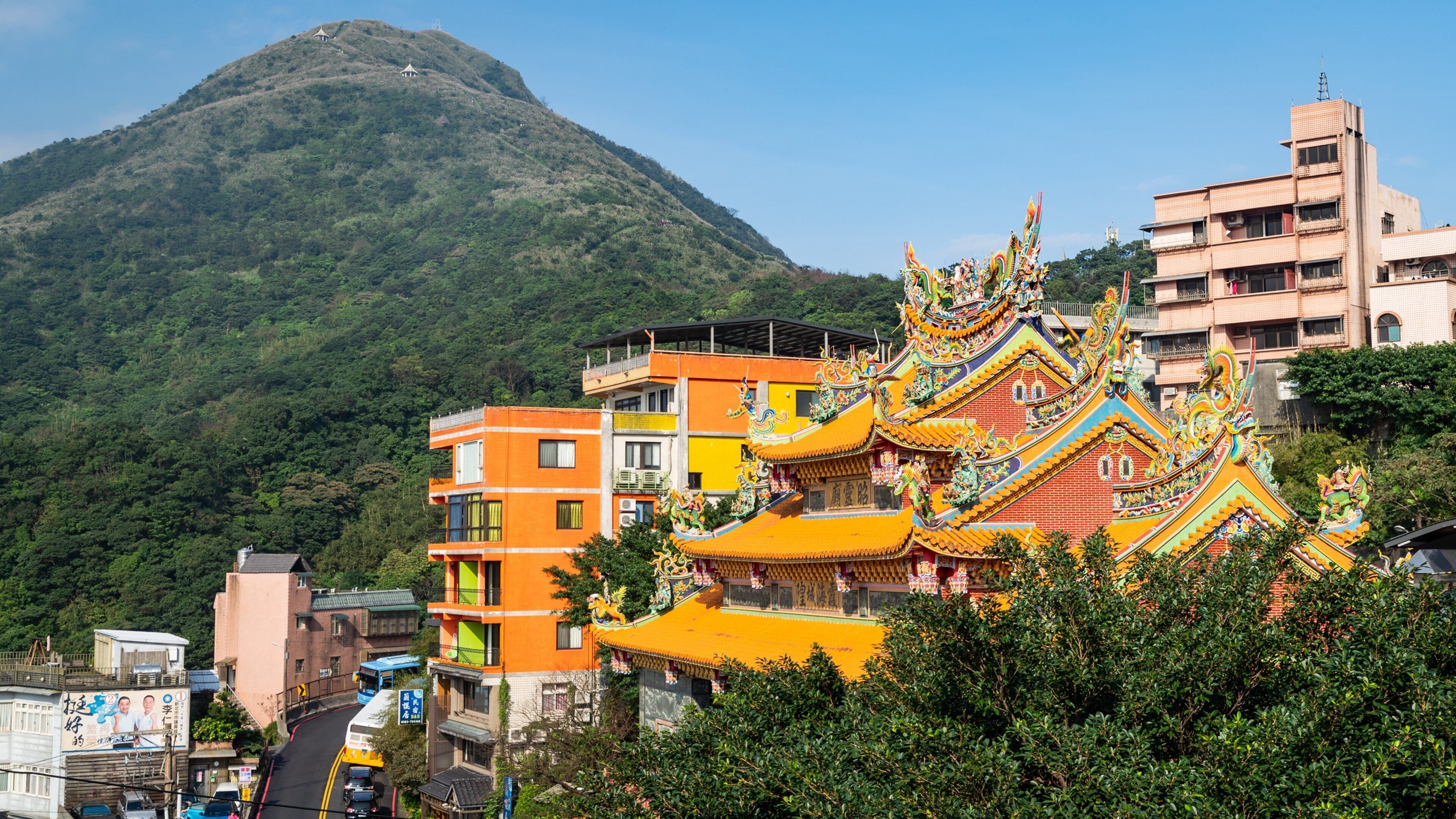 Jiufen which includes mountains, heritage elements and a small town or village