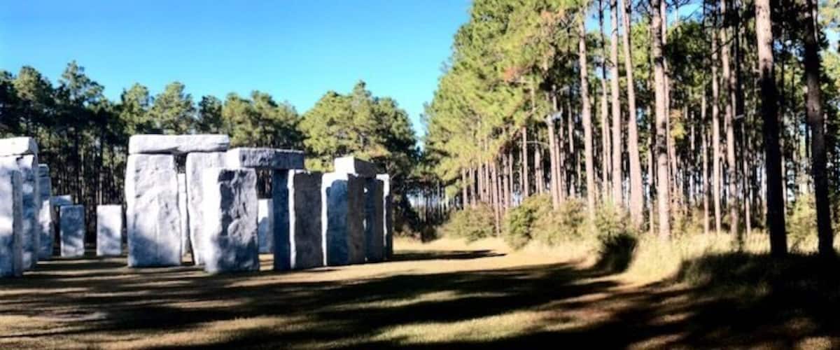 Created by Sculptor Mark Cline for billionaire George Barber, ‘Bamahenge’ is 21 feet tall and 104 feet across, essentially identical in size to the original. It's correctly aligned with the summer solstice; the point of sunrise is over the center of three lintels on the outer markers. There are actually only four different stone shapes, but with clever flipping and repositioning, all of them look different.