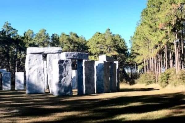 Created by Sculptor Mark Cline for billionaire George Barber, ‘Bamahenge’ is 21 feet tall and 104 feet across, essentially identical in size to the original. It's correctly aligned with the summer solstice; the point of sunrise is over the center of three lintels on the outer markers. There are actually only four different stone shapes, but with clever flipping and repositioning, all of them look different.