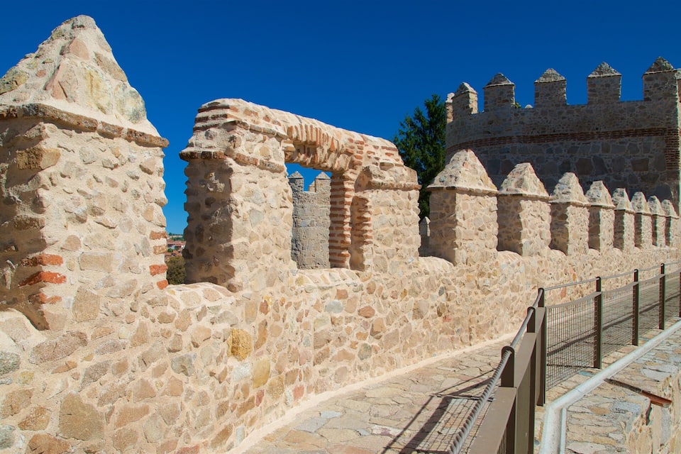 Ancient stone walls and a castle with battlements.