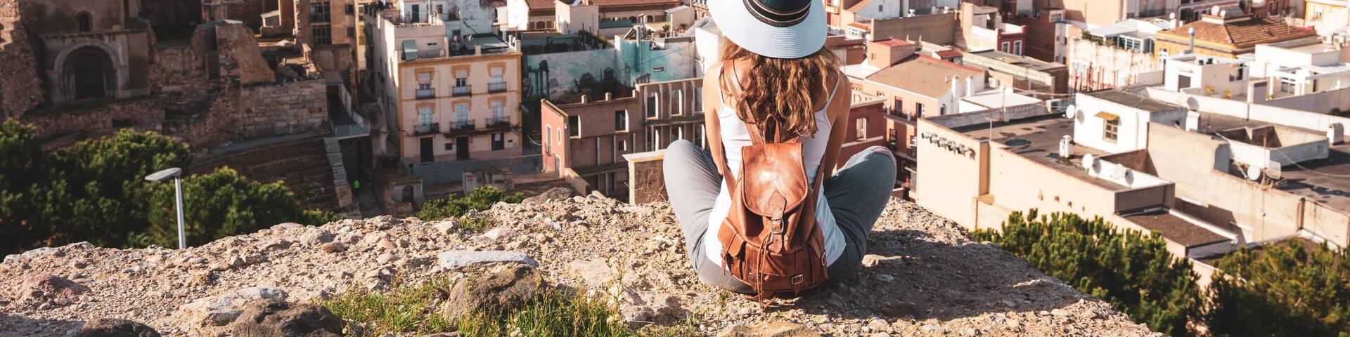 Woman tourist visiting Cartagena city landscape in Spain