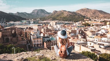 Woman tourist visiting Cartagena city landscape in Spain