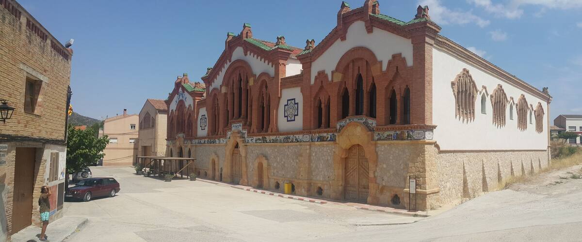 A historic church with arched windows and a tiled facade.