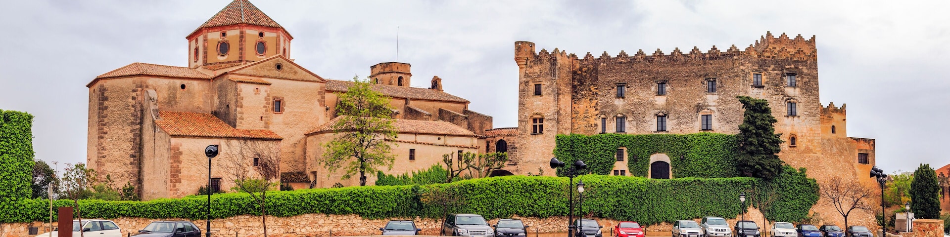 A historic building with a tower and a castle-like structure.